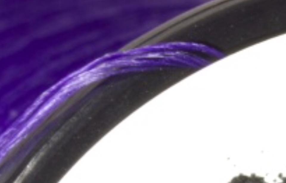Close up of Classic Waxed Thread on a spool. See it lay flat and split with ease!